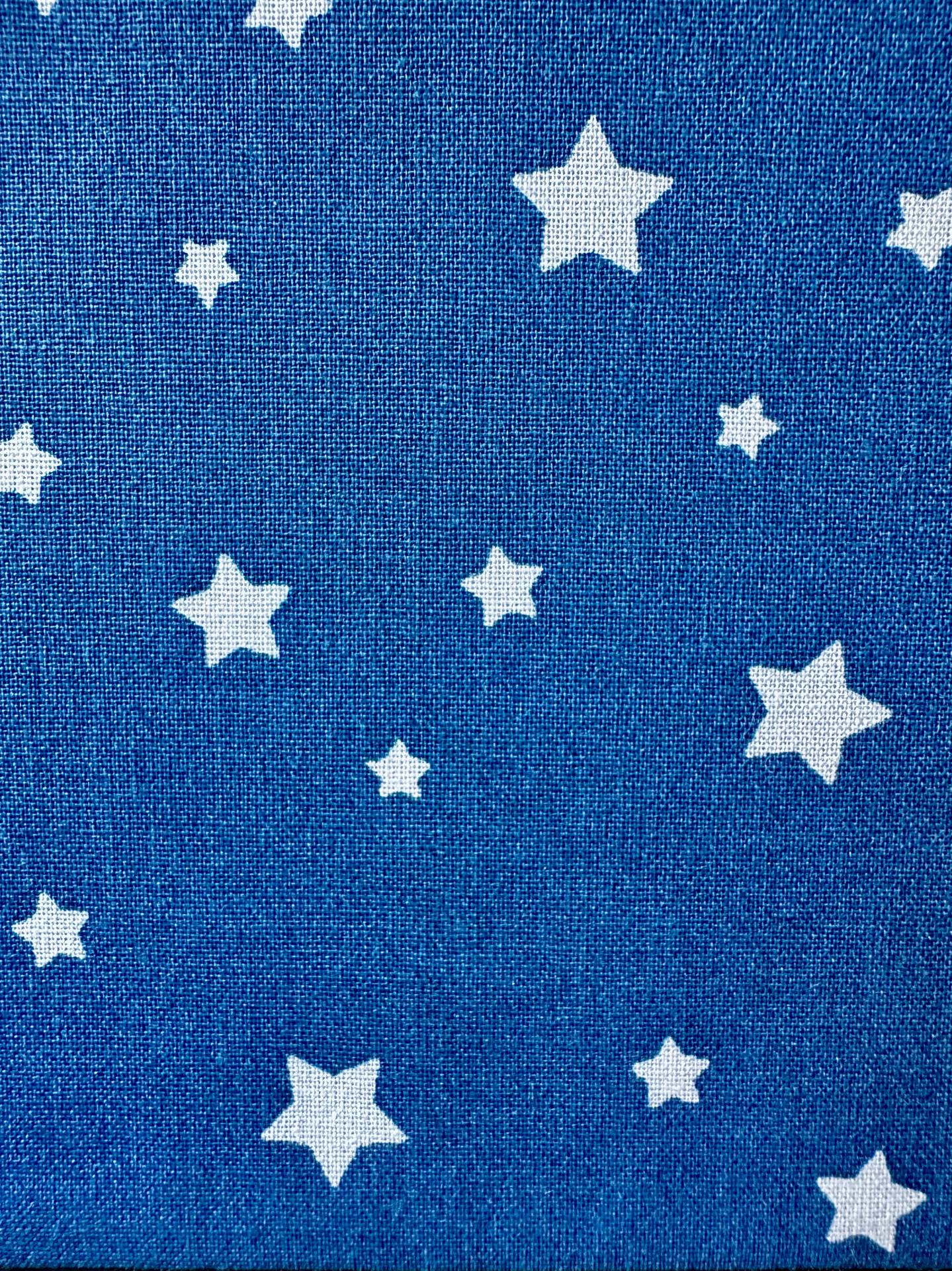 Tissu bleu outre-mer avec étoile blanche